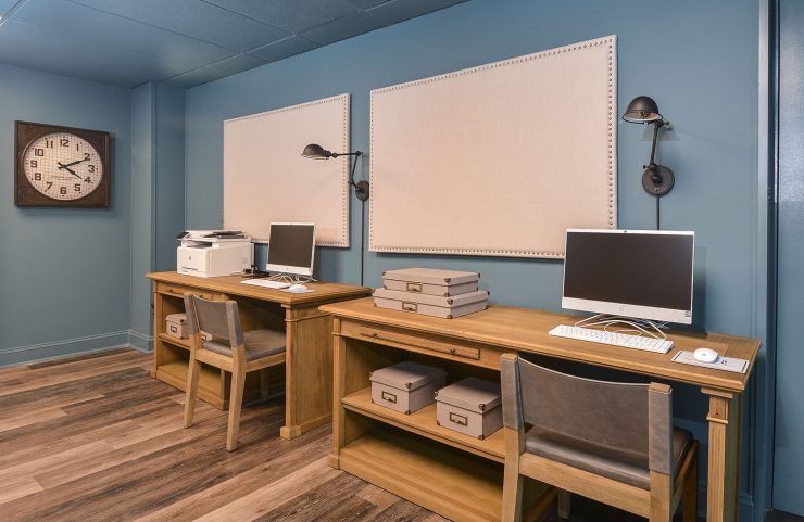 business center with computers and printer 
