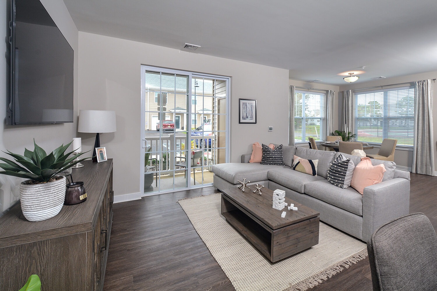 large living room with sliding doors to patio