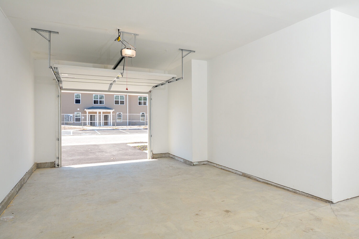 garage with electric garage door opener