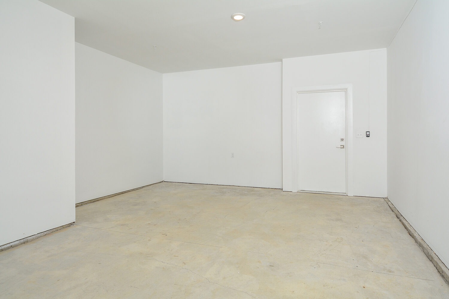 large garage with direct access to apartments