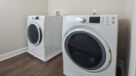 full size washer and dryer in laundry room, select units only