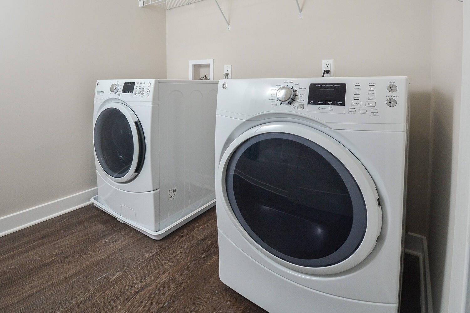 full size washer and dryer in laundry room, select units only