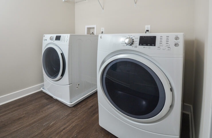 full size washer and dryer in laundry room, select units only