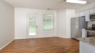eat-in kitchen with a door leading out to an outdoor patio