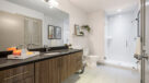 Bathroom With Gorgeous Glass and Porcelain Tiled Shower