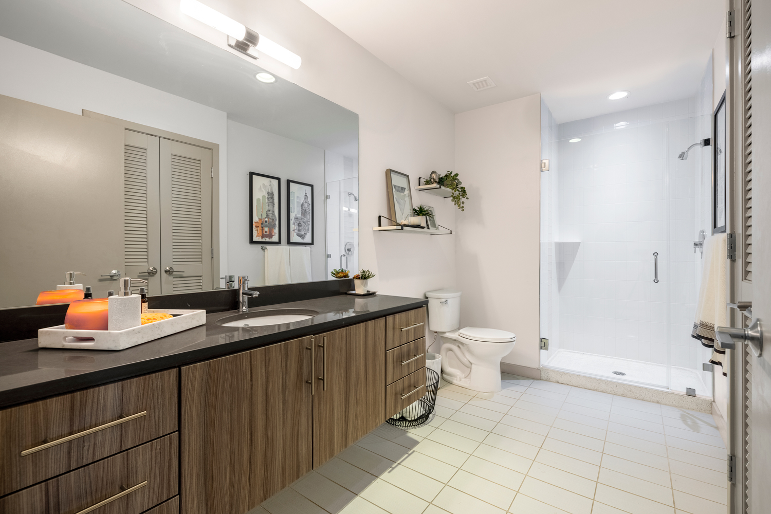 Bathroom With Gorgeous Glass and Porcelain Tiled Shower