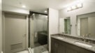 Bathroom With Gorgeous Glass and Porcelain Tiled Showers