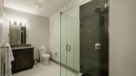 Bathroom With Gorgeous Glass and Porcelain Tiled Showers