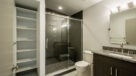 Bathroom With Gorgeous Glass and Porcelain Tiled Showers
