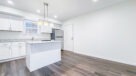upgraded kitchen with large island to seat at 