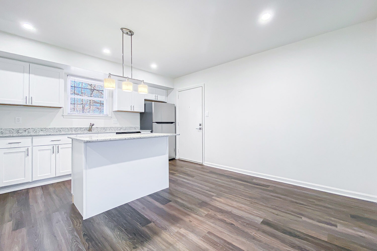 upgraded kitchen with large island to seat at 