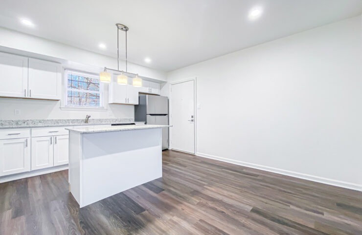 upgraded kitchen with large island to seat at 