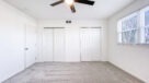 bedroom with two large closets