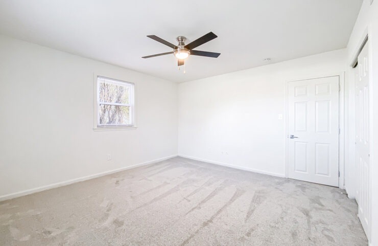 Bedroom with a ceiling fan