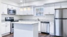 upgraded kitchen with soft close white cabinets