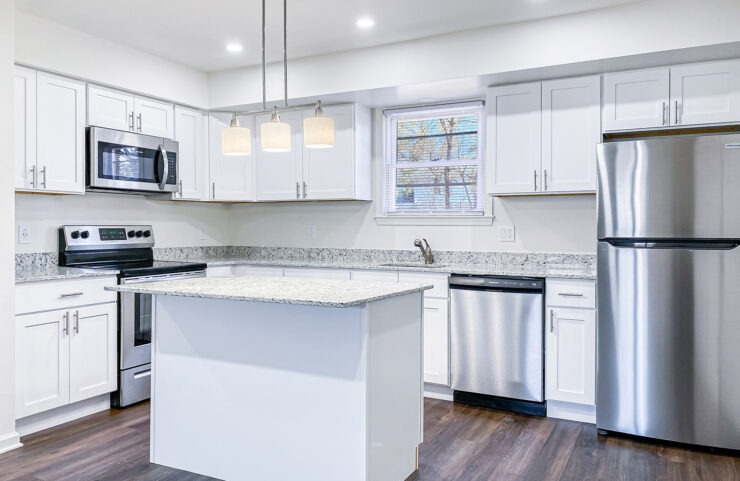 upgraded kitchen with soft close white cabinets