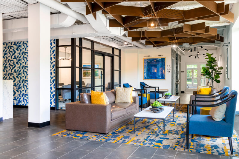 Lounge Area with Comfortable Seating and TVs