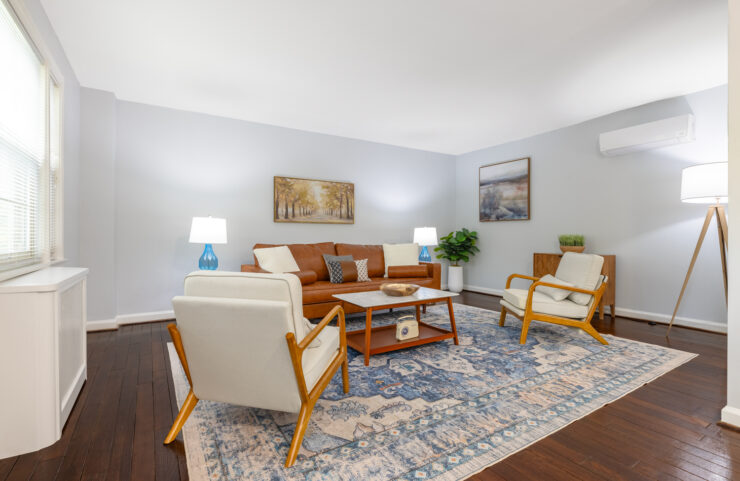 large living room with plank floorin