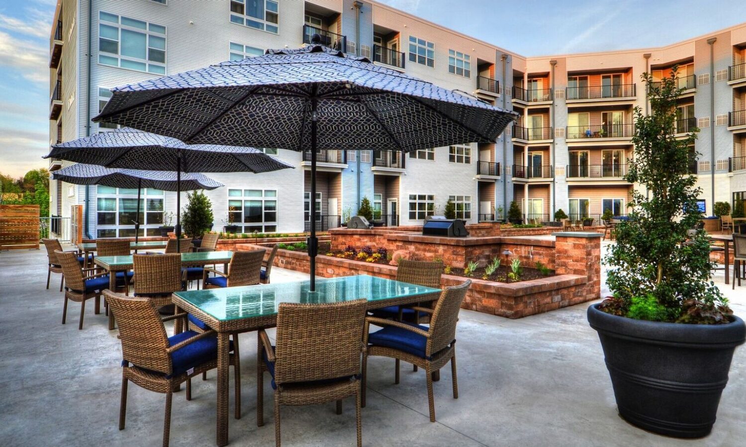 Outdoor living area with grilling station and fire pit