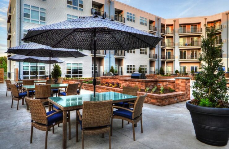 Outdoor living area with grilling station and fire pit