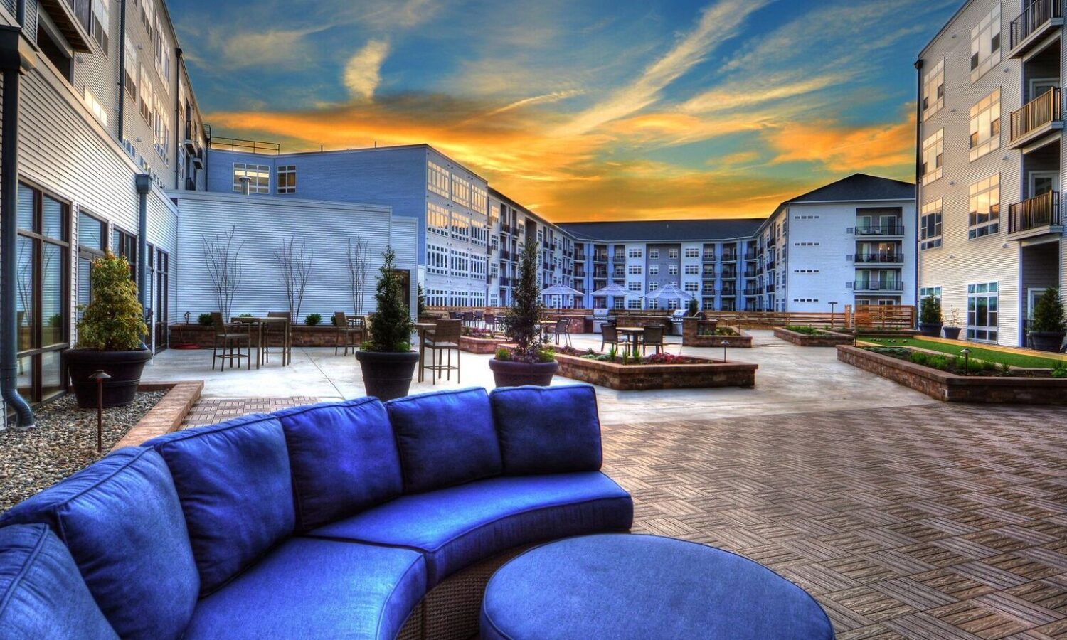Outdoor living area with grilling stations and fire pit