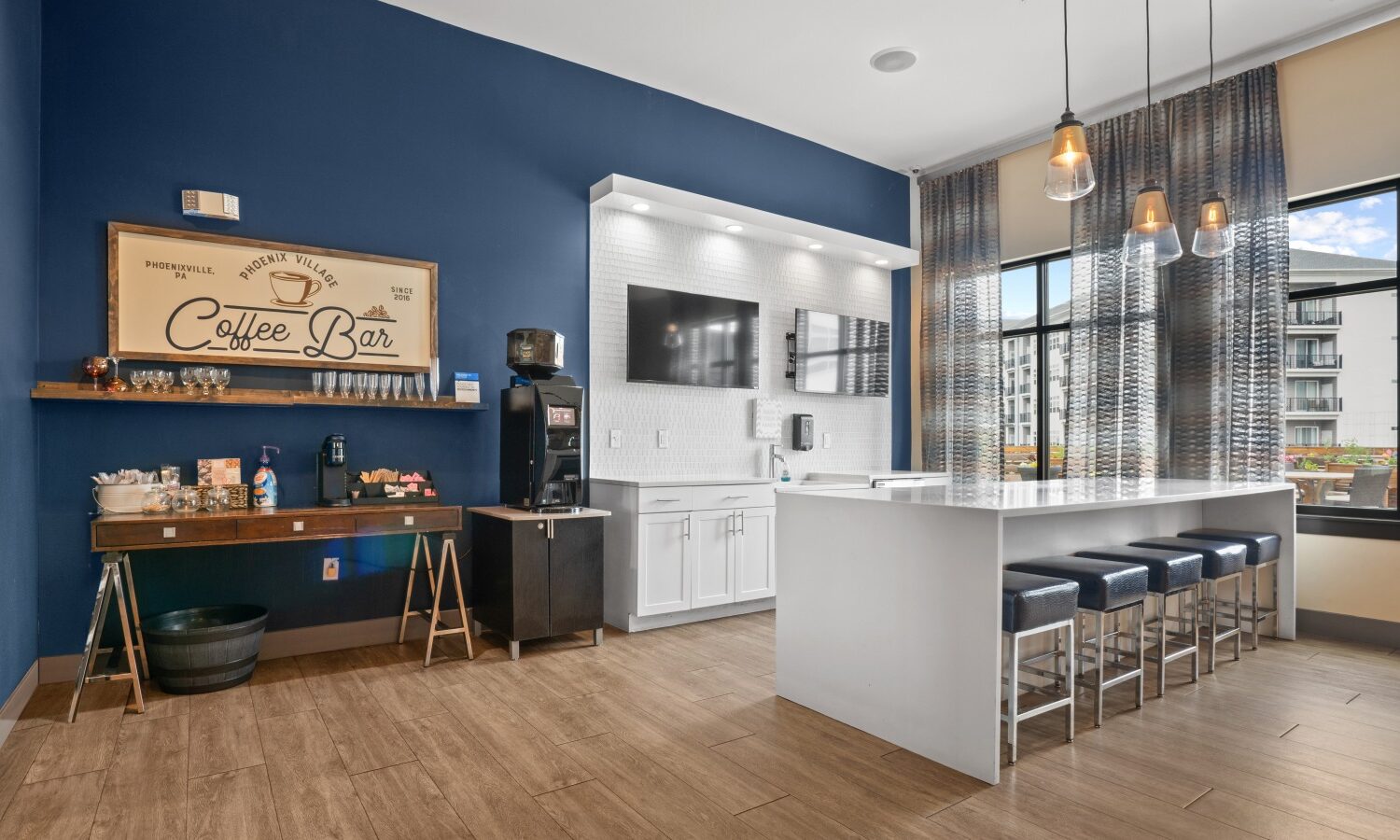 Sophisticated resident lounge with HDTVs