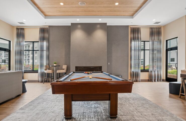 Sophisticated resident lounge with HDTVs, billiards and fireplace