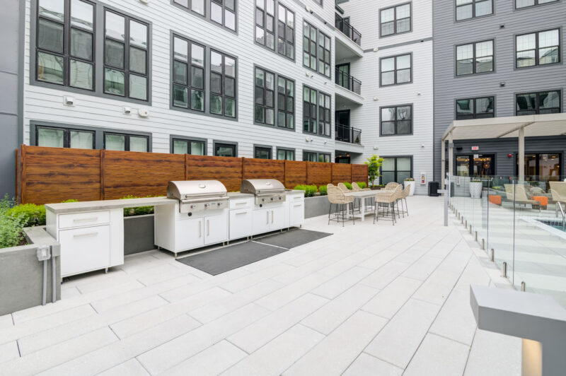 Rooftop terrace with bar, lounge, BBQ grills and fire pits