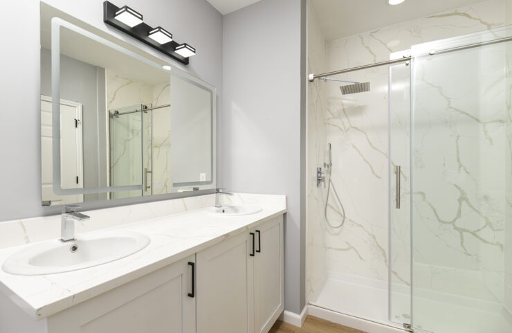 Bathroom With Quartz Shower & Tub and Vinyl Flooring
