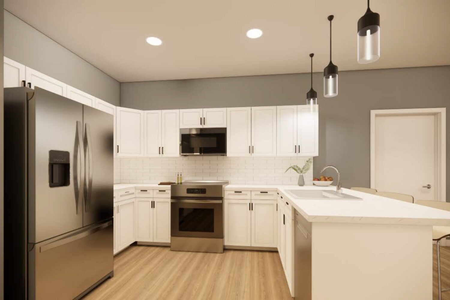 Kitchen With Efficient, Modern Stainless Steel Appliances and Quartz Countertops and Pendant Lighting