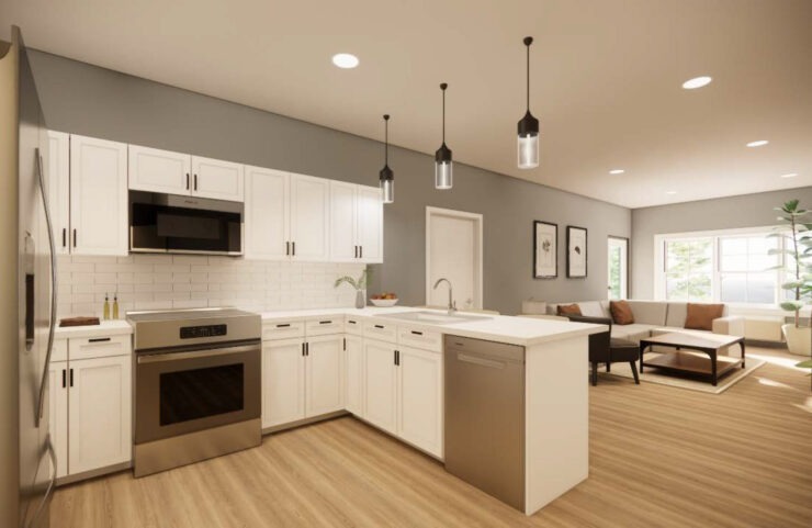 Kitchen With Efficient, Modern Stainless Steel Appliances and Quartz Countertops and Pendant Lighting