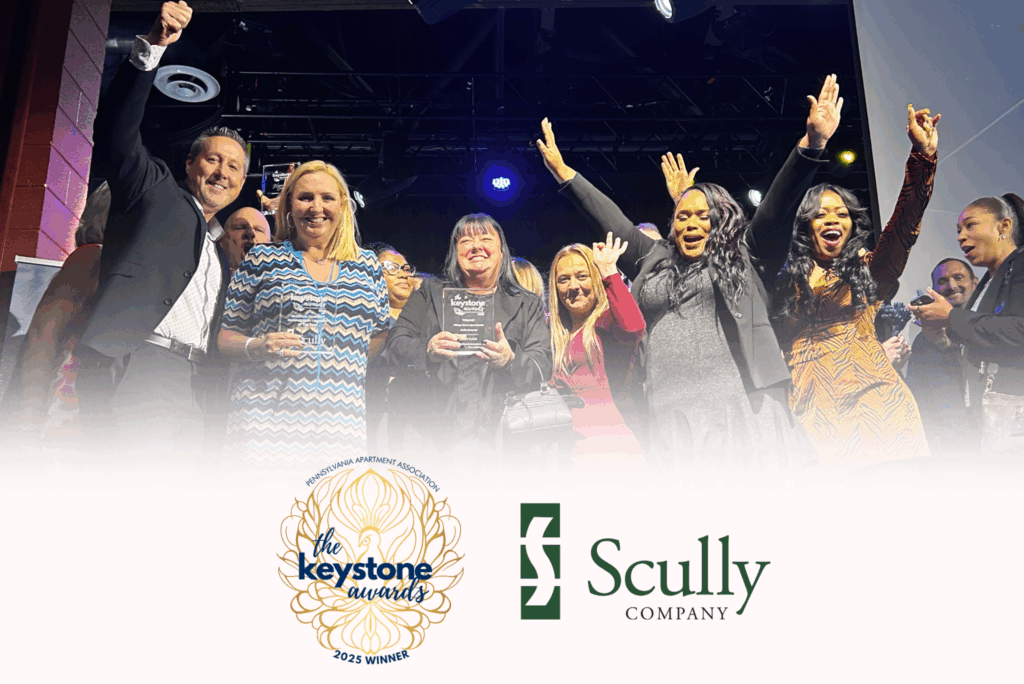 Group photo of Scully Company employees with the Scully logo and Keystone Awards Winner logo