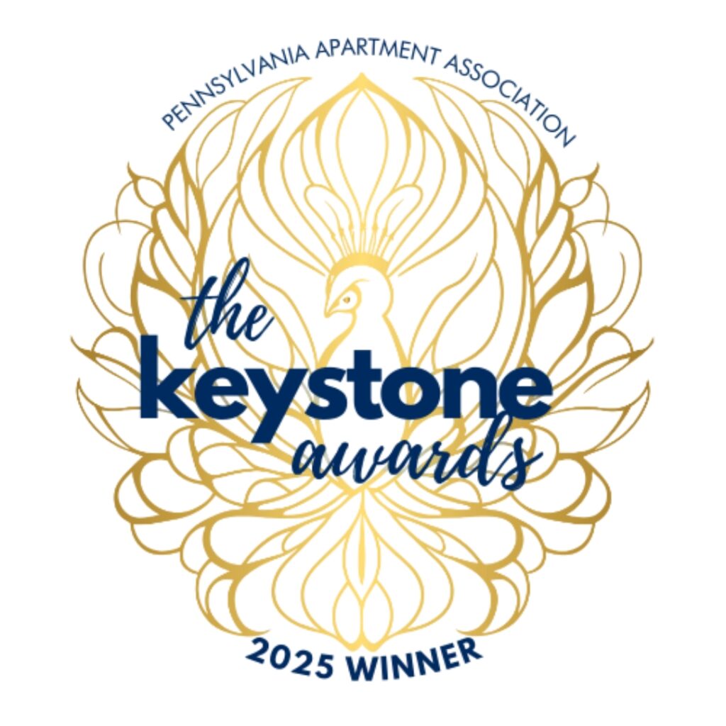 PAA 2025 Keystone Awards Winners Logo, gold and dark blue with a gold peacock in the background