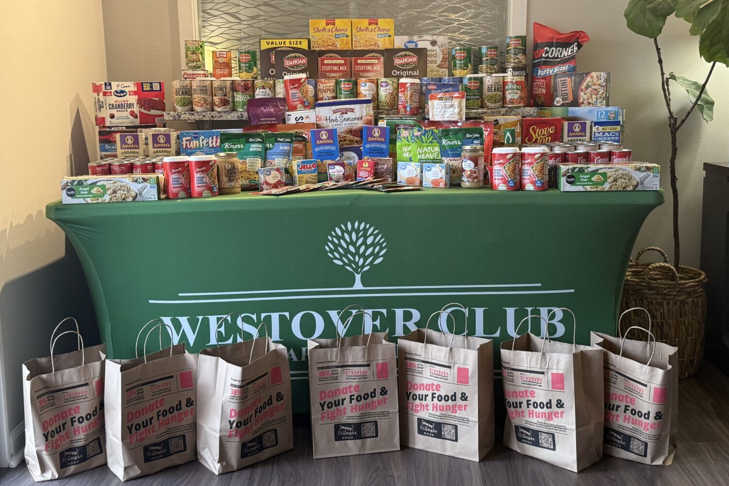 Table covered in donated, non-perishable goods