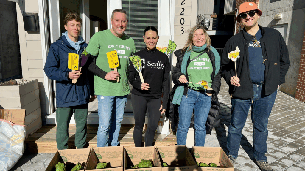 group of Scully Company employees at the Mama Tee pop-up fridge in Philadelphia