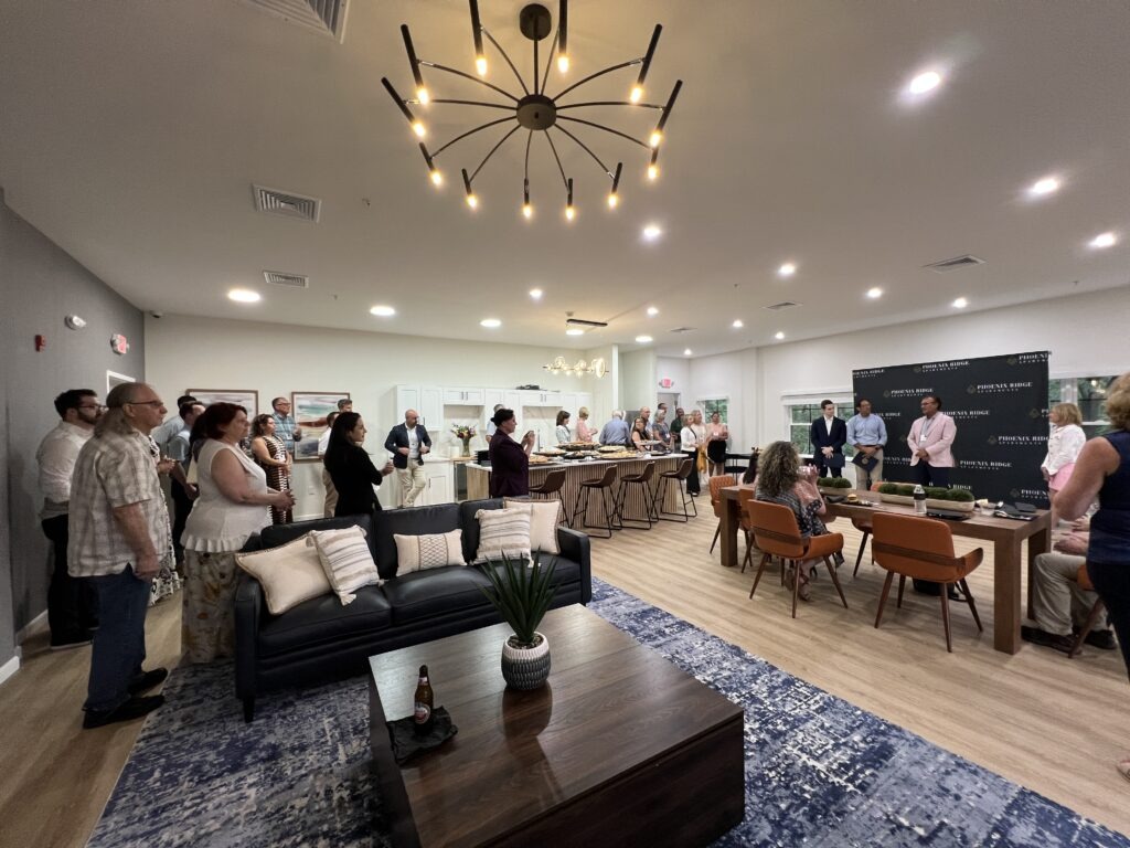 Guests in an event space at Phoenix Ridge Apartments in Allentown, PA