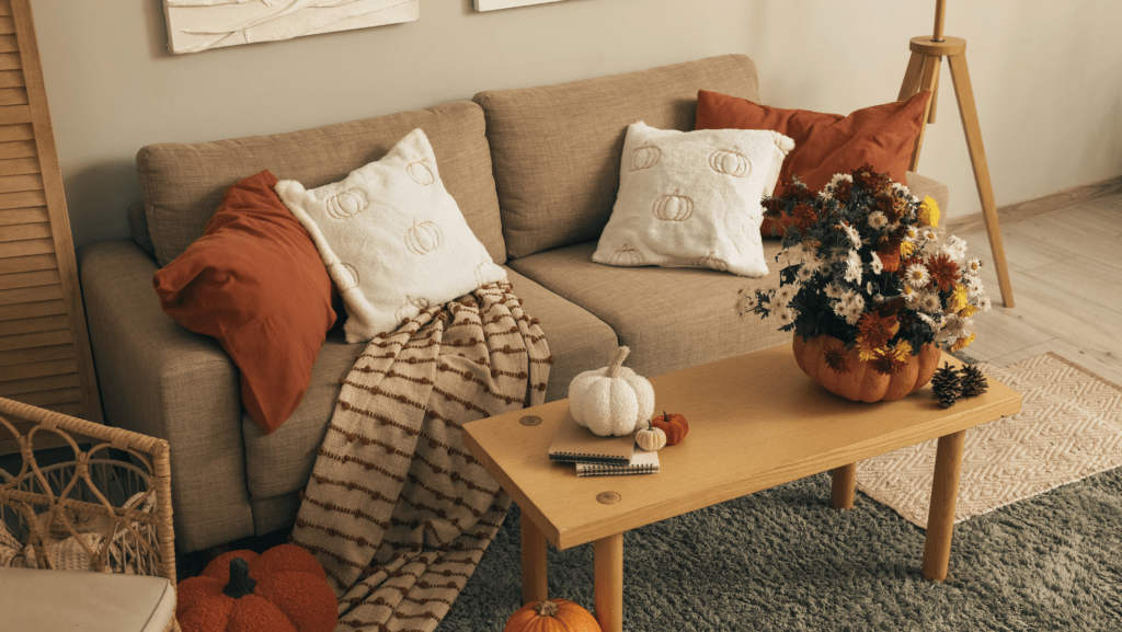 cozy apartment with pumpkin decorations and pillows for apartment decorations