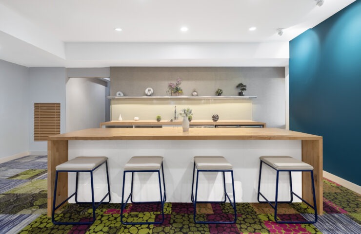 resident lounge with shared kitchen and table to seat 10 